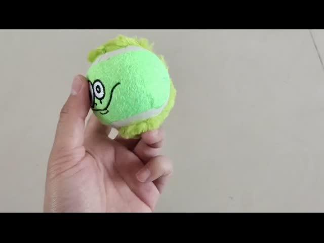 green tennis ball toy for pets